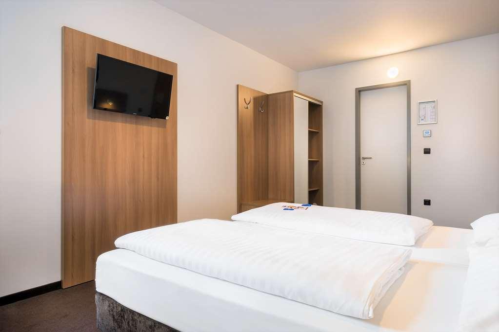 Novum Hotel Bruy Штутгарт Номер фото