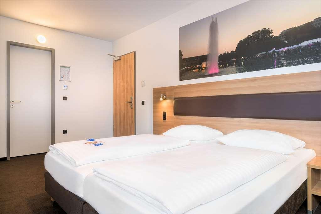 Novum Hotel Bruy Штутгарт Номер фото